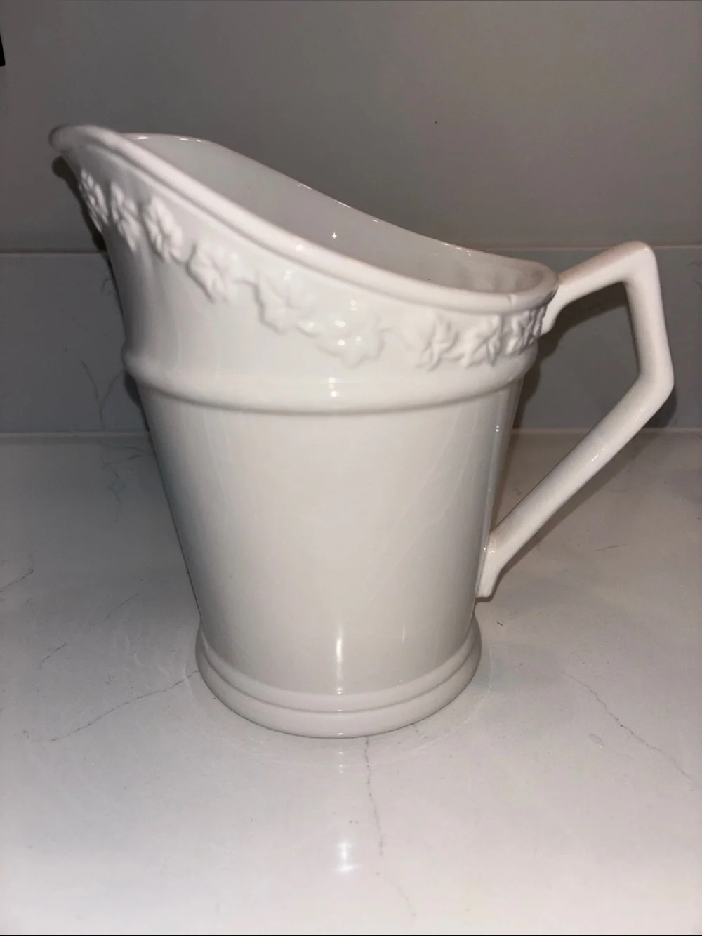 Ivory Ceramic Pitcher with Raised Ivy Border